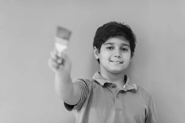 Portrait of a happy young boy painter — Stock Photo, Image