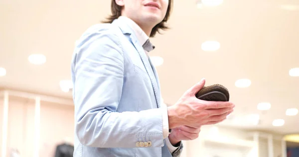 Man Chooses Shoes At Shoe Store — Stock Photo, Image