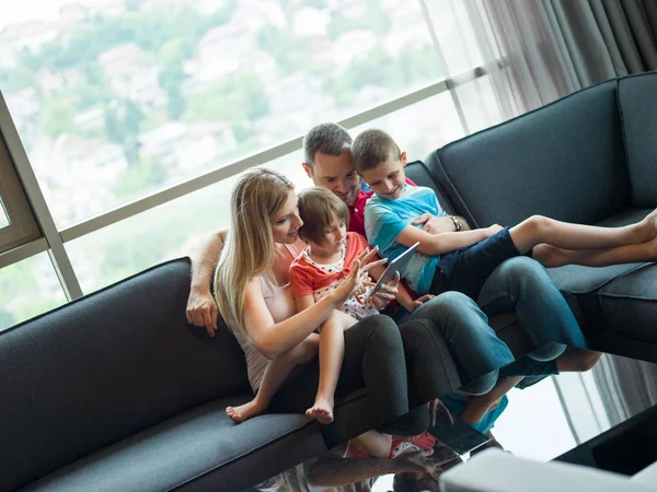 Young cuple spending time with kids — Stock Photo, Image