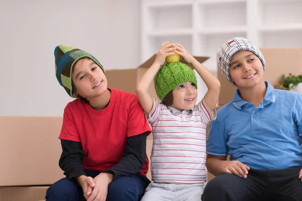 Boys with cardboard boxes around them — Stock Photo, Image