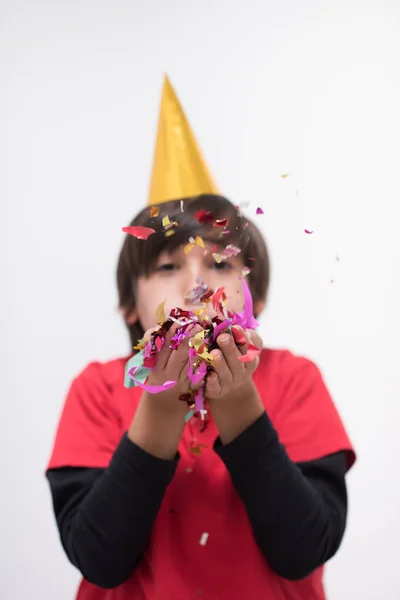 Criança Feliz Comemorando Festa Com Soprando Confete — Fotografia de Stock