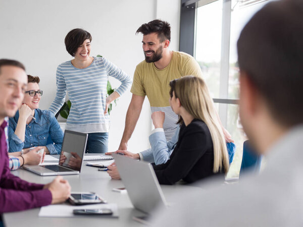 Group of business people discussing business plan  in the office