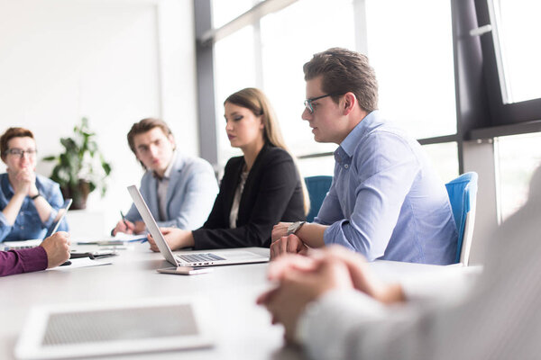 Group of business people discussing business plan  in the office