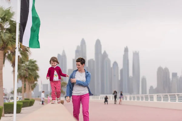 Mother and cute little girl on the promenade — Stock Photo, Image