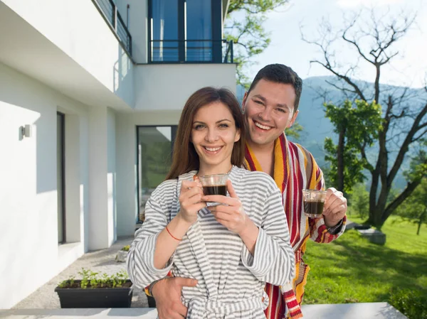 Young beautiful couple in bathrobes