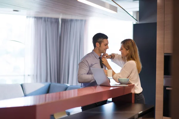 A young couple is preparing for a job and using a laptop — Stock Photo, Image