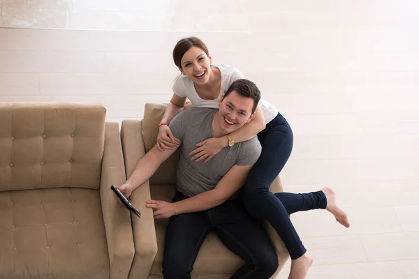 Couple relaxing at  home with tablet computers — Stock Photo, Image