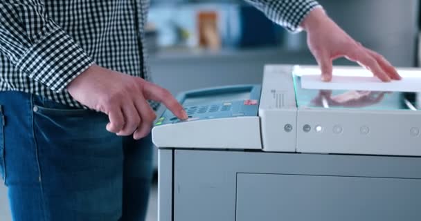 Male Assistant Using Copy Machine — Stock Video