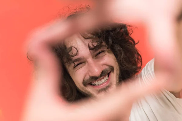 Young man with funny hair over color background — Stock Photo, Image