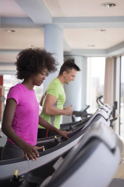 People exercising a cardio on treadmill — Stock Photo, Image