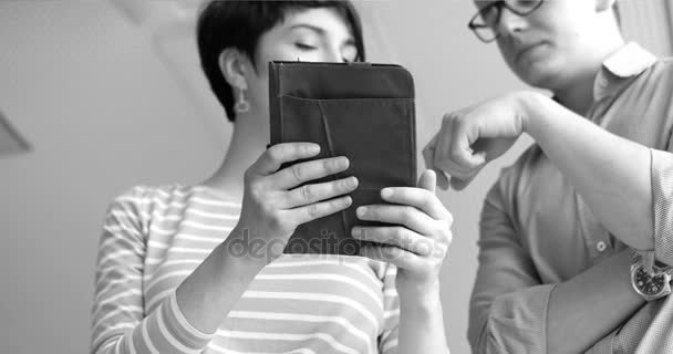 Two Business People Working With Tablet in startup office — Stock Video