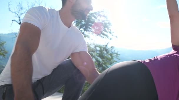 Couple doing stretching and exercising at home — Stock Video