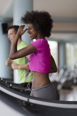 people exercising a cardio on treadmill  clipart