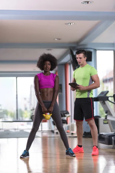 Weights workout with personal trainer at  crossfit gym — Stock Photo, Image