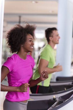 people exercising a cardio on treadmill  clipart