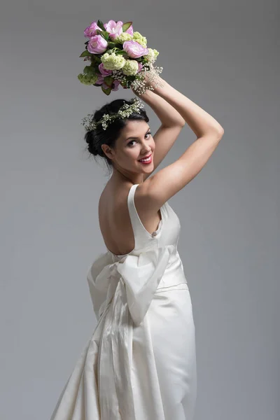 Bride with a bouquet  isolated — Stock Photo, Image