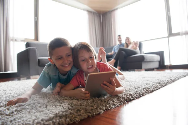 Couple spending time with kids — Stock Photo, Image