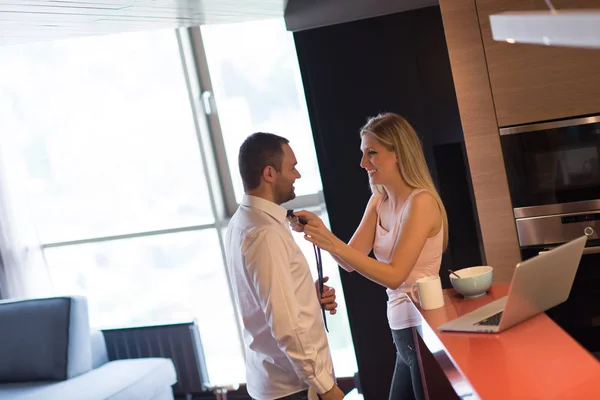 A young couple is preparing for a job and using a laptop — Stock Photo, Image