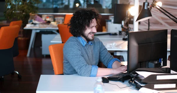Businessman working using a computer in startup office — Stock Photo, Image
