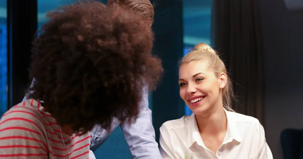 Multiethnic startup business team in night office — Stock Photo, Image