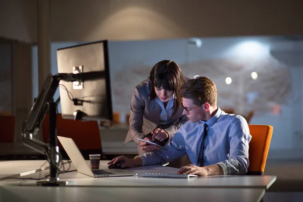 Young designers in the night office — Stock Photo, Image