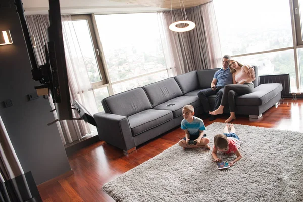 Couple spending time with kids — Stock Photo, Image