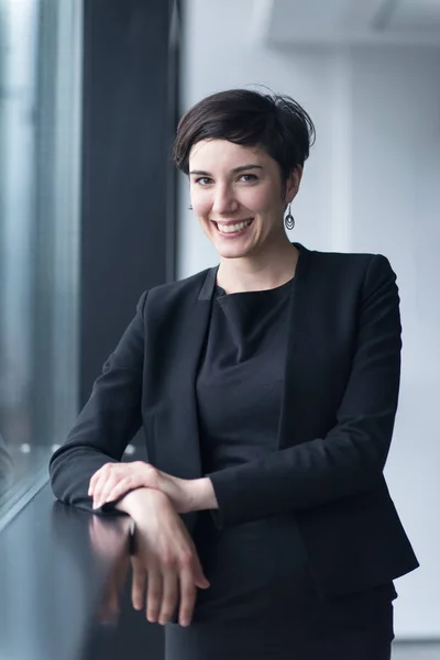 Successful Businesswoman by the window — Stock Photo, Image