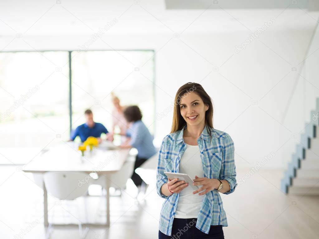 casual businesswoman using tablet 
