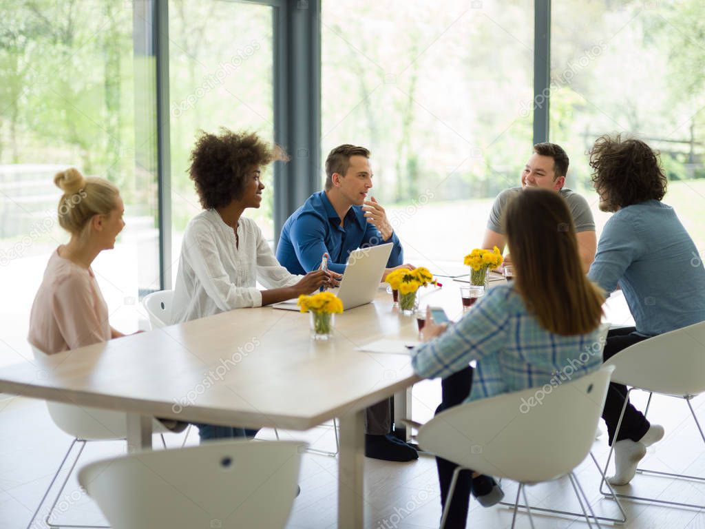 Multiethnic startup Business Team At A Meeting at modern office 