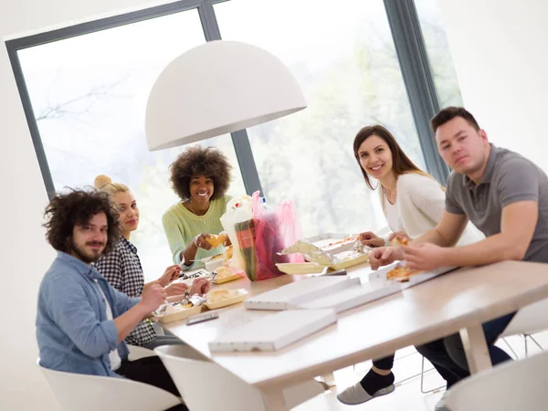 Multiethnic group of happy friends lunch time — Stock Photo, Image
