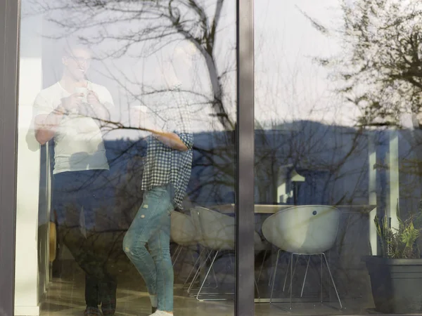 Young couple enjoying morning coffee — Stock Photo, Image