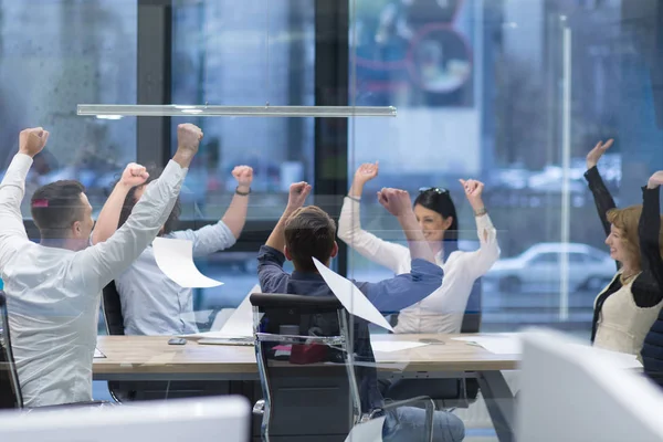 Startup Group of young business people throwing documents — Stock Photo, Image