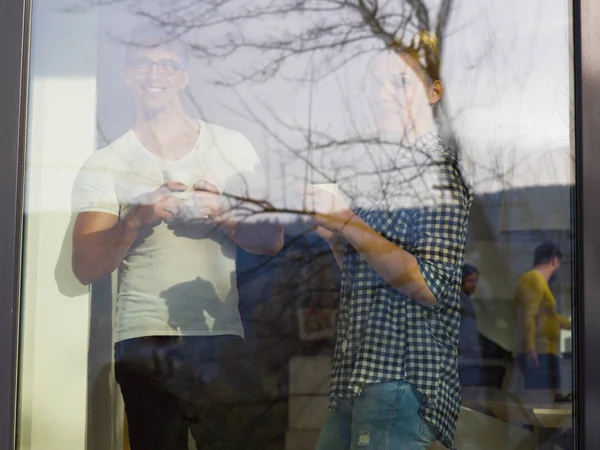 Young couple enjoying morning coffee — Stock Photo, Image