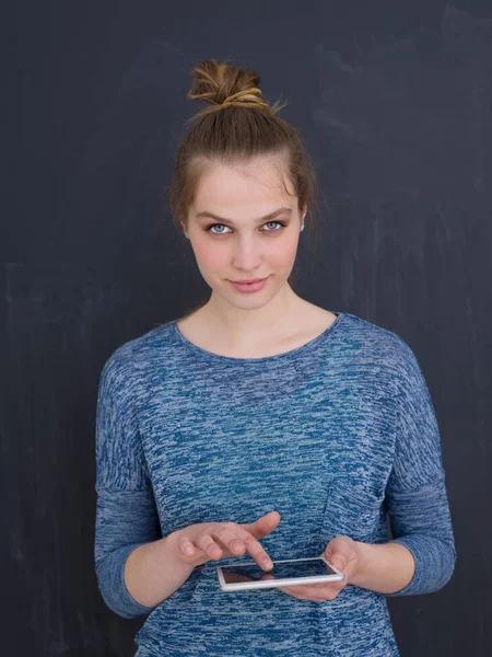 Woman using tablet computer isolated over gray — Stock Photo, Image
