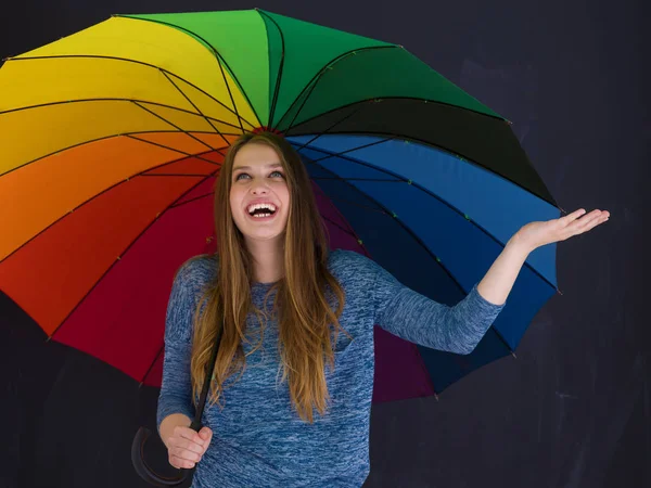 Mujer guapa con un paraguas colorido —  Fotos de Stock