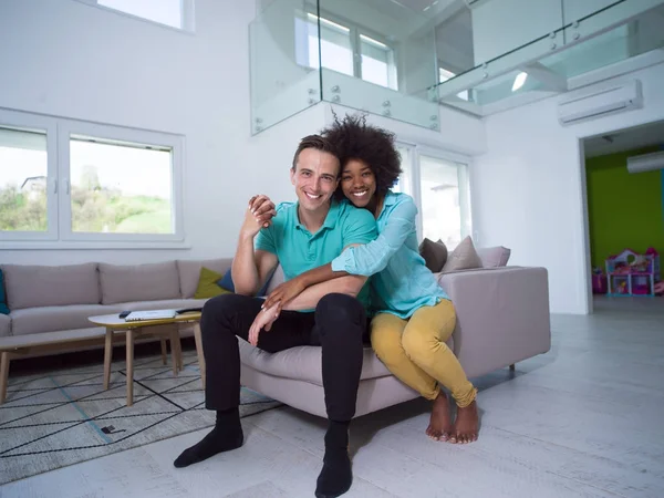 Multiethnic couple hugging — Stock Photo, Image