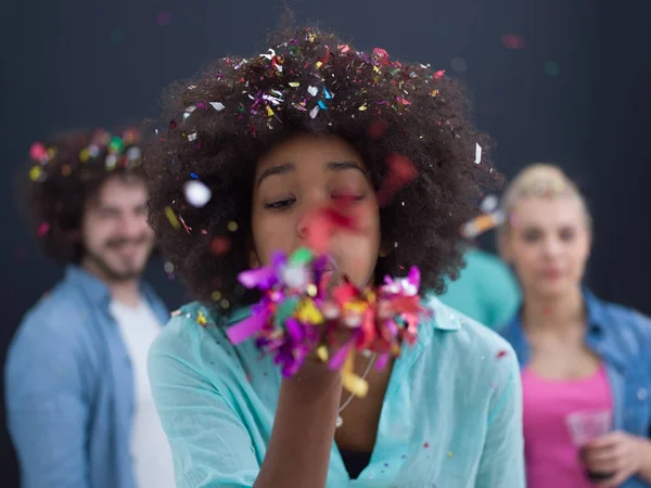 Confetti party multiethnic group of people isolated over gray — Stock Photo, Image