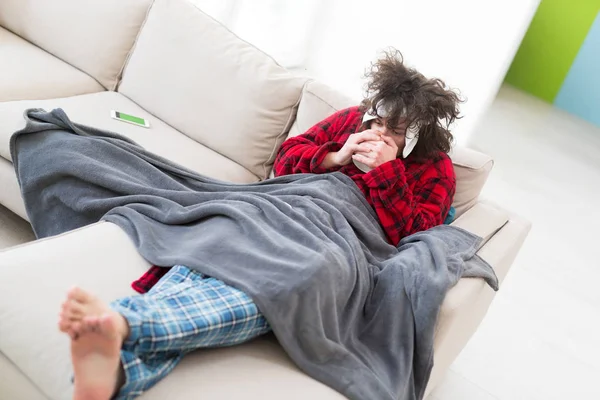 Young Man with flu and fever — Stock Photo, Image