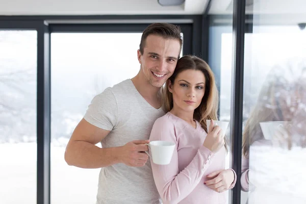 Young couple enjoying morning coffee — Stock Photo, Image