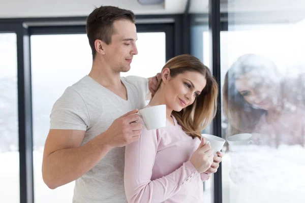 Young couple enjoying morning coffee — Stock Photo, Image