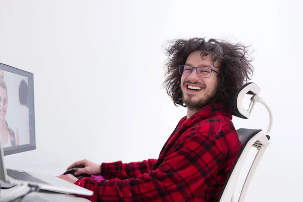 Graphic designer in bathrobe working at home — Stock Photo, Image