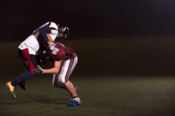 Amerikaanse voetballers in actie — Stockfoto