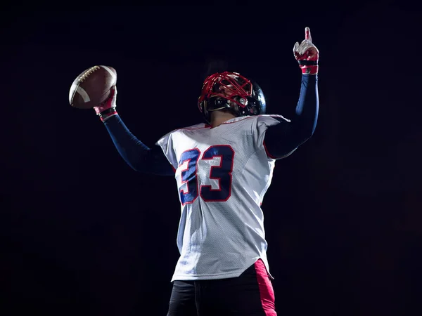 Jugador de fútbol americano celebrando después de anotar un touchdown —  Fotos de Stock