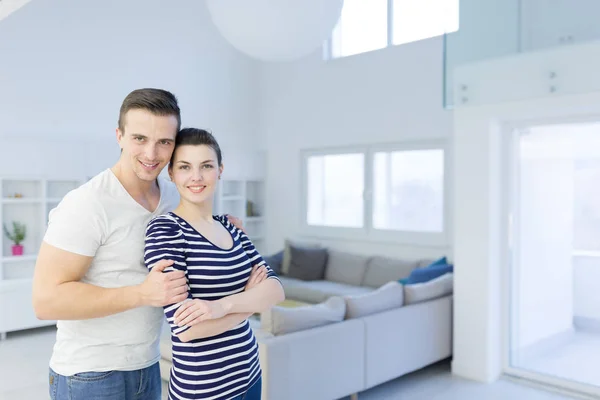 Couple hugging in their new home Royalty Free Stock Photos