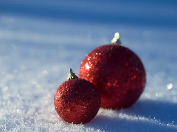 Christmas balls decoration in snow — Stock Photo, Image