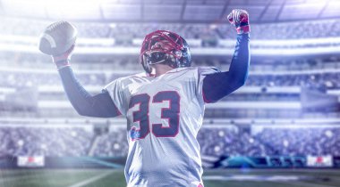 touchdown büyük modern stadyum alanında ışıkları ve mercek parlamaları geceleri puanlama sonra kutluyor Amerikan futbolu oyuncusu