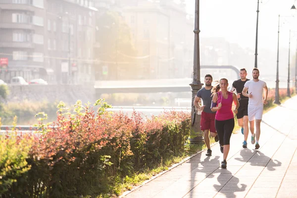 Group Young Sporty People Jogging Sunny Morning City — Stock Photo, Image