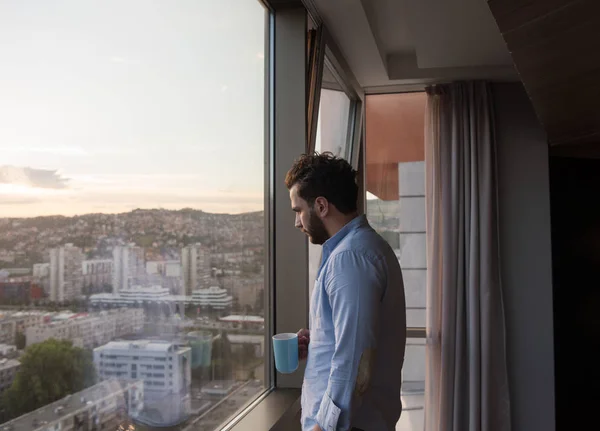 Young Man Enjoying Evening Coffee Beautiful Sunset Landscape City While — Stock Photo, Image