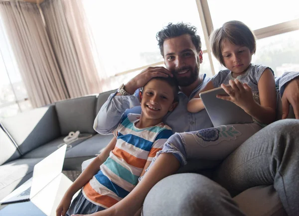 Happy Father Spending Time Kids Using Tablet Computer Armchair Home — Stock Photo, Image