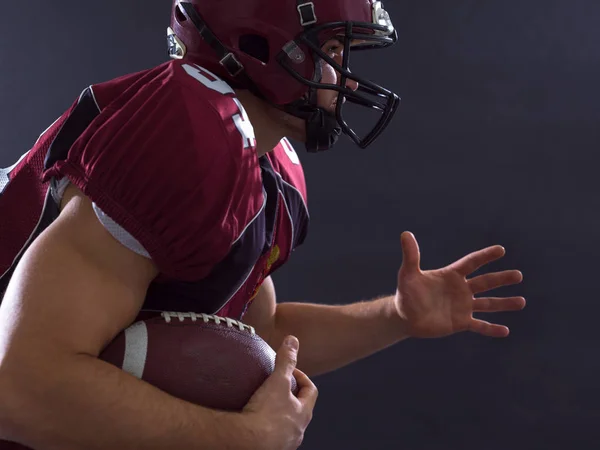 American football speler met de bal — Stockfoto
